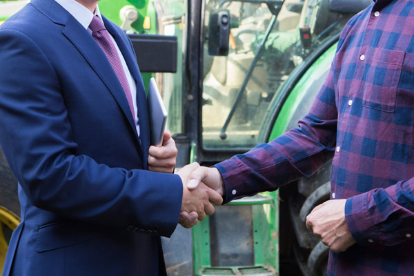abc suit handshake